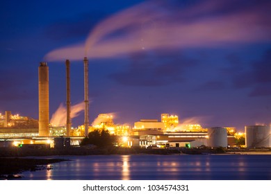 Pollution Emission Climate Change From Chimney Power Electricity Station At Gove Aluminium Refinery, Gove Peninsular, Northern Territory, Queensland, Australia   