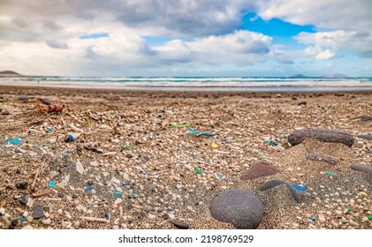 	
Pollution Of The Oceans With Plastic Waste - Washed Up Micro Plastic Particles On The Beach Of Fuerteventura	
