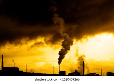 Pollution from smoke stack at a factory production bad for the environment - Shutterstock ID 1520439266