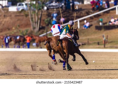 Polo game game action unrecognizable riders players horses pony challenge for ball fast equestrian sport .