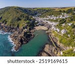 Polperro, Cornwall, an aerial photo of town, cliffs and sea