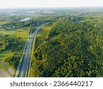 Białobrzegi, Polska, 09.24.2023, drone shot - S7 expressway, visible forest, fields, cars, gas station