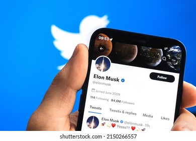 Poltava, Ukraine - April 26, 2022: Elon Musk Twitter profile and social media logo background