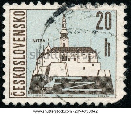 POLTAVA, UKRAINE - Desember 22, 2021. Vintage stamp printed in Czechoslovakia circa 1965 shows Czech Towns Nitra