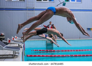 POLTAVA, UKRAINE – MAY, 18: Swimmers Jump Into The Water During The Tournament On Swimming POLTAVA CUP 2017 At The Sports Pool Delfin 18 May 2017