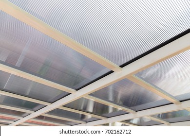 Polycarbonate awning roof on metal beam structure