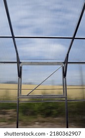 Polycarbonate greenhouse with iron frame elements of construction