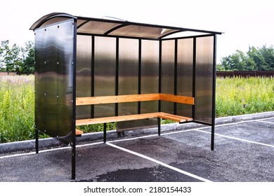 Polycarbonate transparent glass plastic, bus stop outside the city, no people, polycarbonate products, bus waiting area, canopy from rain and sun, transport station