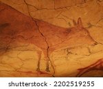 Polychrome great deer in Altamira cave near european Santillana del Mar town in Cantabria province in Spain in 2019 on September.