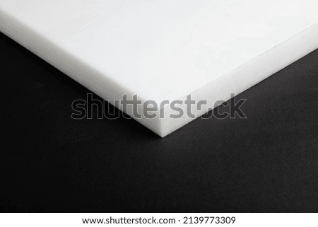 polyelite, delrin, polyamide, teflon sheet on a white background.