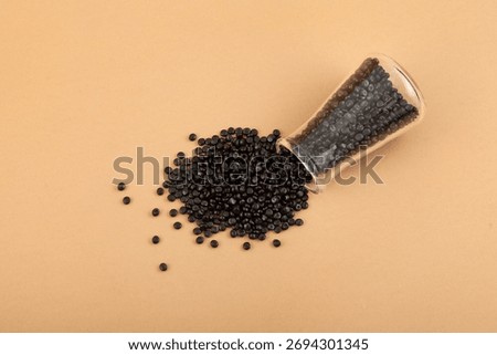 Polyethene or poly(methylene) granules. Other names: Polyethylene, Polythene. Black masterbatch, PE pellets. Granulated plastic compound. Virgin polymer.