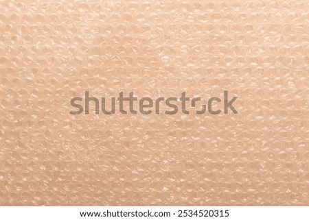 Polyethylene bubble wrap used to pack and ship fragile items, White bubble wrap packing texture. Air cushion film background