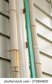 Polyethylene plastic pipe on the wall, closeup of photo