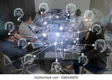 Polygonal brain shape of an artificial intelligence with various icon of smart city Internet of Things Technology over Group Of Multiethnic people brainstorming together, AI and business IOT concept