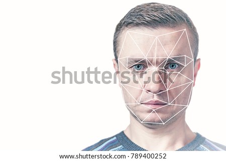A polygonal face recognition grid located on the face of a man, biometric detection