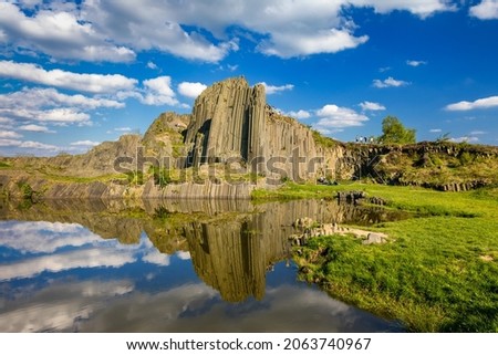 Polygonal structures of basalt columns, natural monument Panska skala near Kamenicky Senov, Czech Republic. Basalt organ pipes of Panska Skala near Kamenicky Senov, Czechia. 