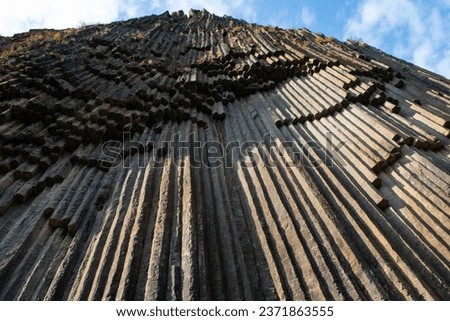 polygonal structures made of basalt columns, called the “Symphony of Stones” or “Basalt Organ” in the Garni Gorge (Armenia). Basalt is a volcanic rock formed as a result of the rapid cooling of lava ストックフォト © 