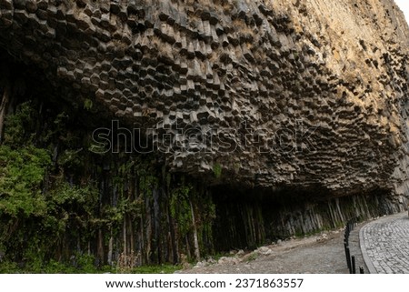 polygonal structures made of basalt columns, called the “Symphony of Stones” or “Basalt Organ” in the Garni Gorge (Armenia). Basalt is a volcanic rock formed as a result of the rapid cooling of lava ストックフォト © 
