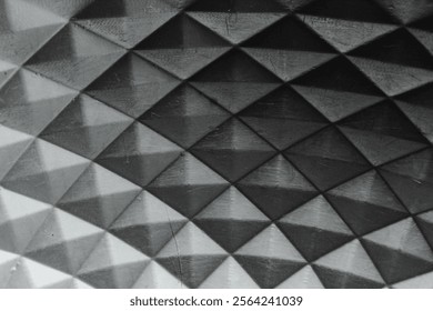 Polygonal texture and background in black and gray. geometric triangles