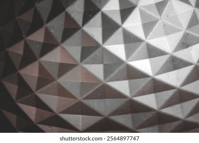 Polygonal texture and background in black and gray. geometric triangles