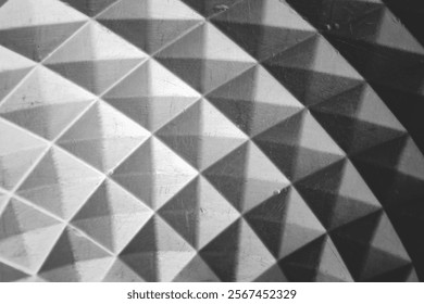 Polygonal texture and background in black and gray. geometric triangles
