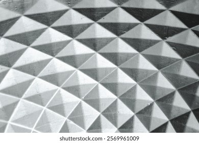Polygonal texture and background in black and gray. geometric triangles