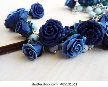 Polymer Clay Bracelet With Light And Dark Blue Roses And Blue Beads