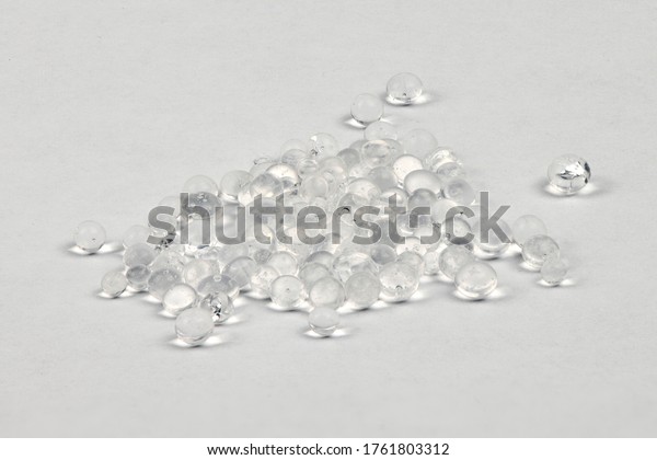 Polymer pellets.\
Pile of silica gel. Isolated on a white background. High resolution\
photo. Full depth of\
field.