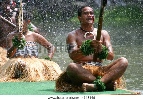POLYNESIAN CULTURAL CENTER, HI - JUNE 15: \
Dancers and performers demonstrating traditional Polynesian culture\
on 6/15/2005.