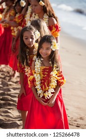 Polynesian Hula Dancers at the Ocean in Hawaii