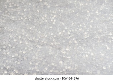 Polypropylene granule close-up background texture.