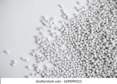 Polypropylene granule close-up background texture. plastic resin ( Masterbatch).Grey chemical granules for industrial plastic production