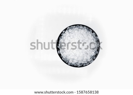 Polypropylene granule close-up background texture.