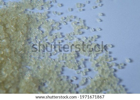 Polypropylene granule close-up background texture. plastic resin ( Masterbatch).Grey chemical granules for industrial plastic production
