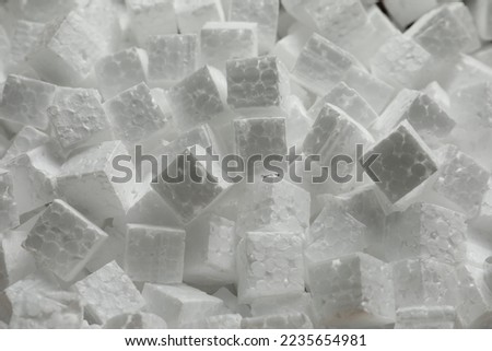 Polystyrene styrofoam pieces for packaging as background, closeup