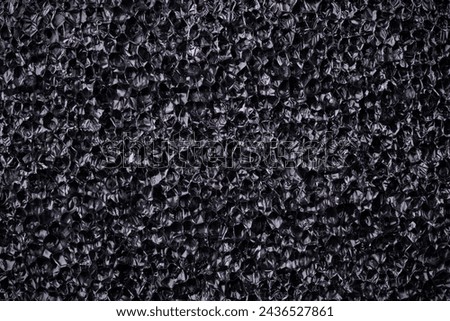 polyurethane foam dark background with texture