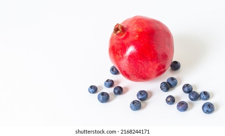 Pomegranate Blueberry Antioxidant Herbal Tea On White, Clear Glass Mug With Handle