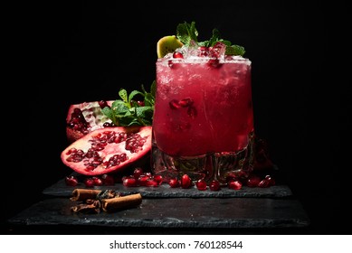 Pomegranate Cocktail On The Black Background