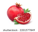 Pomegranate with cut in half isolated on white background. Clipping path.