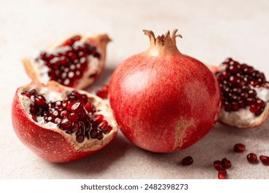 Pomegranate. Fresh organic juicy pomegranate fruit pieces. Pomegranate seeds, grains. - Powered by Shutterstock