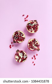 Pomegranate. Fresh Ripe Pomegranate Overhead Light Pink Background. Top View, Copy Space