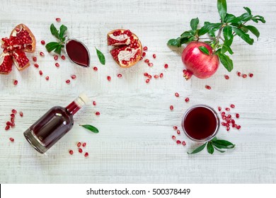 Pomegranate Fruits, Seeds And Sauce.