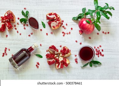 Pomegranate Fruits, Seeds And Sauce.