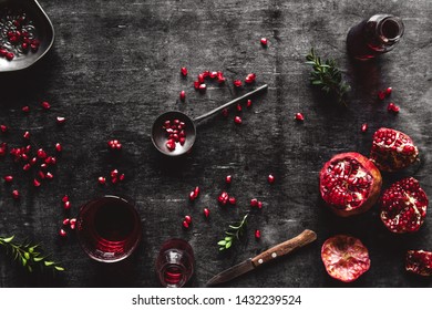 Pomegranate On Black Textured Background. Overhead Text View Image.