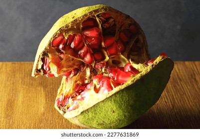 POMEGRANATE WITH RED PIPS SPLIT WIDE OPEN - Shutterstock ID 2277631869