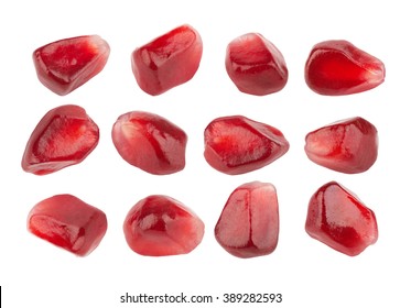 Pomegranate seeds closeup, isolated on white background