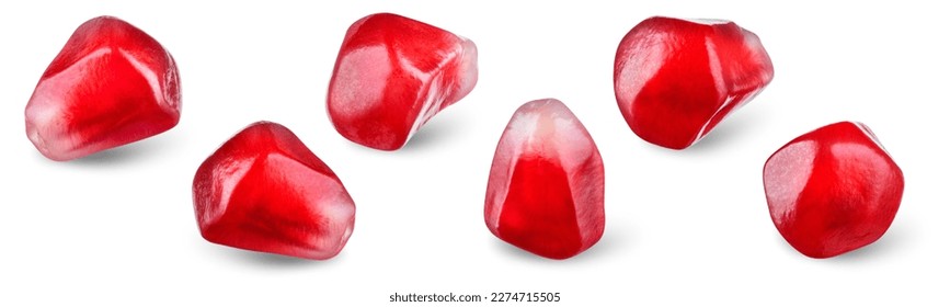 Pomegranate seeds isolated. Pomegranate grains collection on white background. Flat lay pomegranate with clipping path. Full depth of field. Top view.