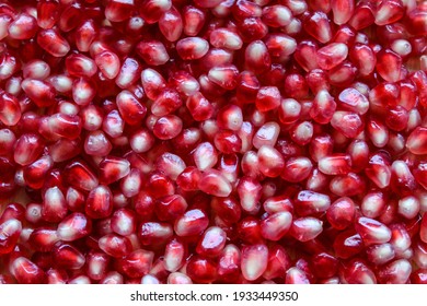 Pomegranate seeds. Macro. Close up. Ripe pomegranate seeds.
