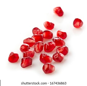 pomegranate seeds on a white background