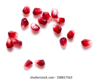 pomegranate seeds on a white background - Powered by Shutterstock